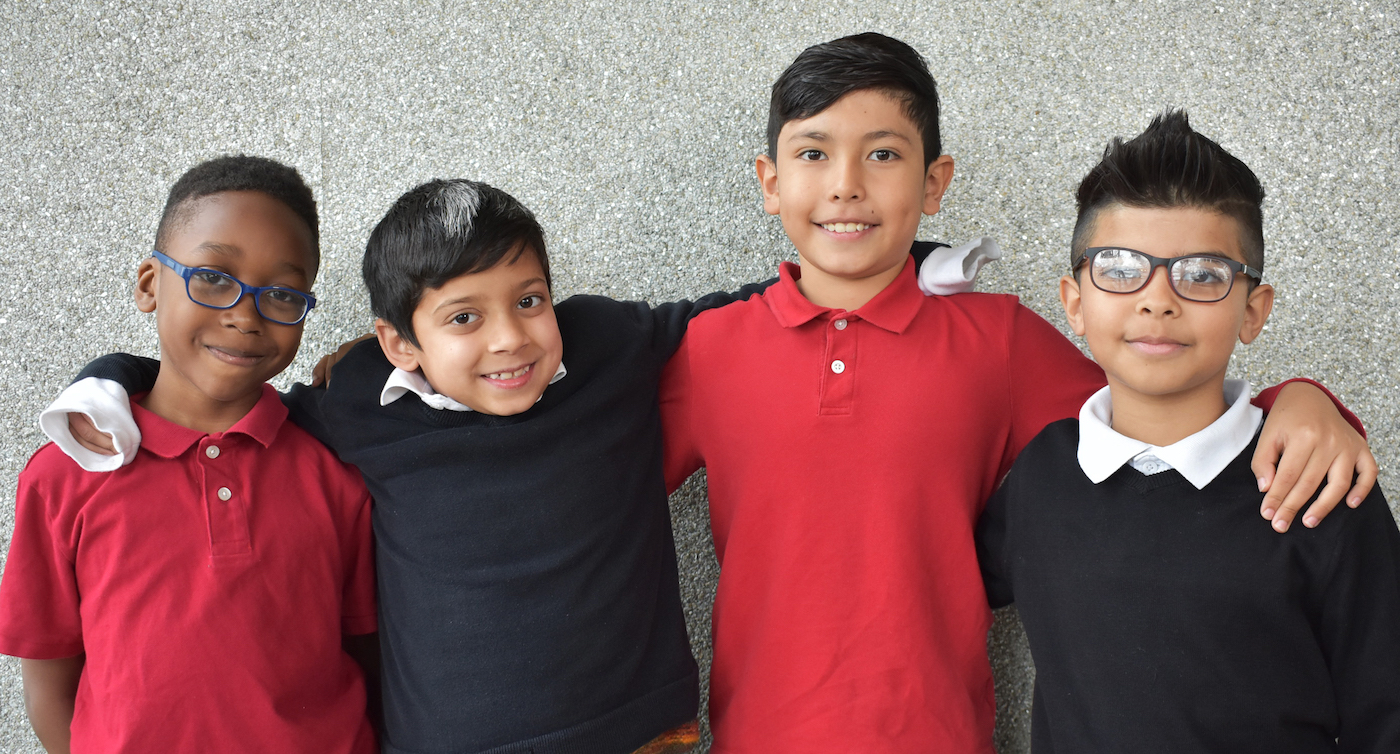 Four Hope Academy Students in uniform